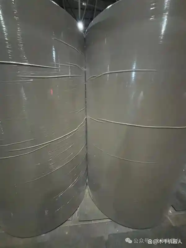 木牛机器人实现窄板及侧翻板运输车无缝对接装车，技术突破再升级